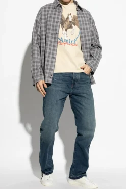 Amiri NIEBIESKI Jeansy z efektem `vintage`