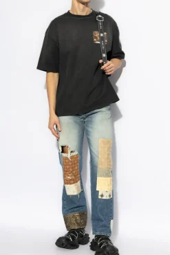 Amiri NIEBIESKI Jeansy z efektem `vintage`