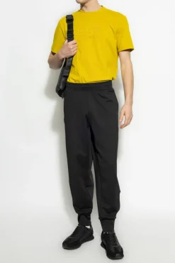EA7 Emporio Armani CZARNY Spodnie z naszywką z logo