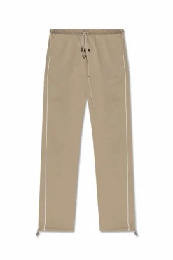 Fear Of God Essentials beżowy Dresowe spodnie z lampasami