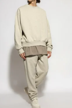 Fear Of God Essentials kremowy Dresowe spodnie