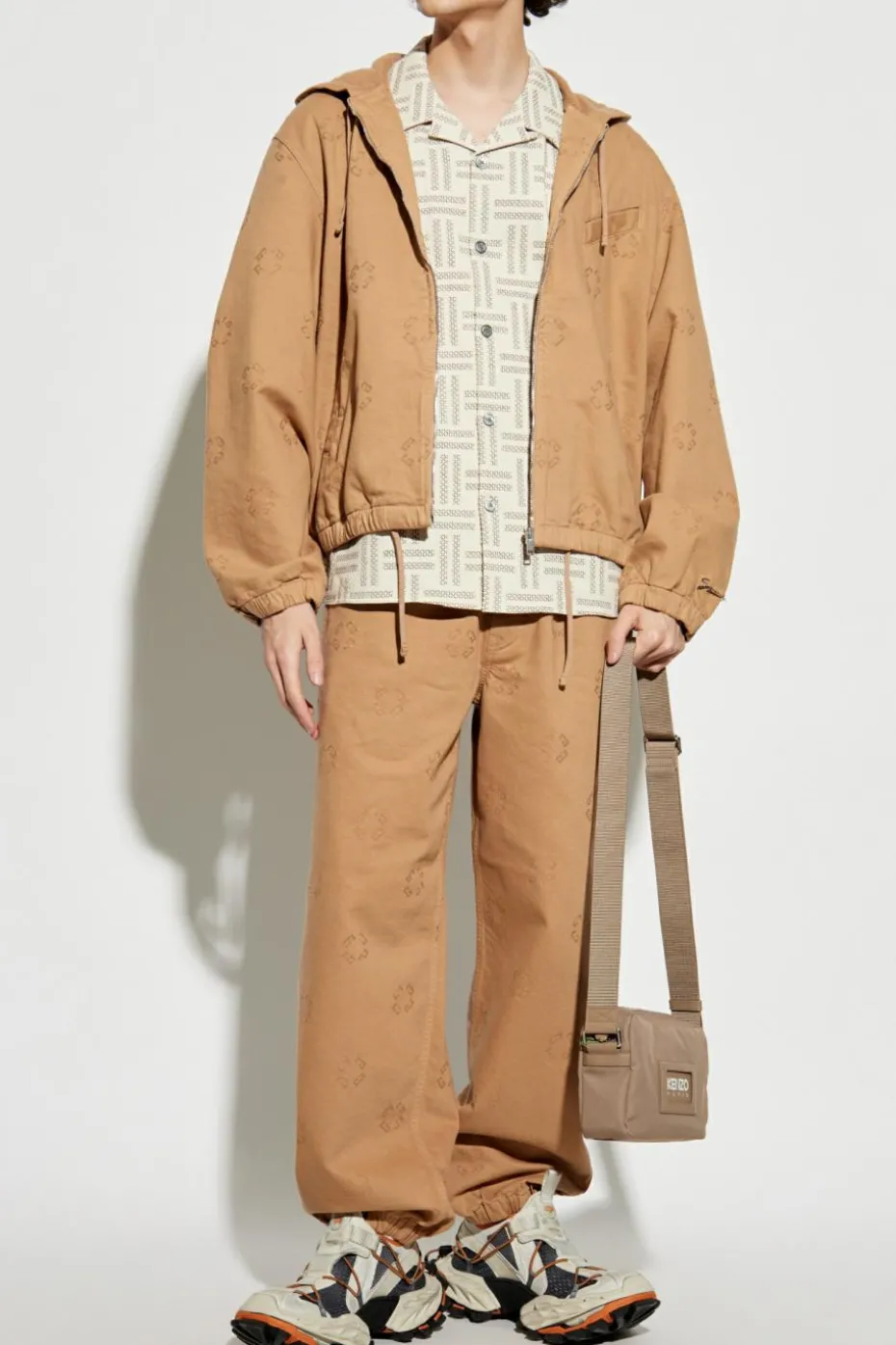 Givenchy beżowy Bawełniane spodnie z aplikacją w kształcie logo