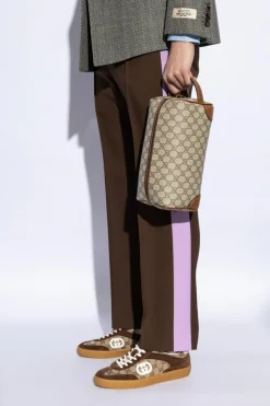 Gucci beżowy Kosmetyczka `GG Emblem Medium`