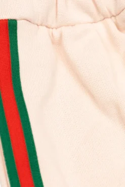 Gucci Kids RÓŻOWY Spodnie dresowe z charakterystycznym paskiem `Web`