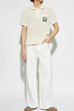 Lacoste kremowy Polo z logo