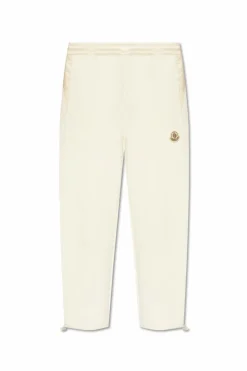 Moncler kremowy Spodnie dresowe z naszywką z logo
