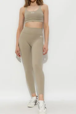 Sporty & Rich beżowy Legginsy treningowe `SR Runner`