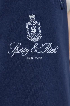 Sporty & Rich GRANATOWY Spodnie dresowe z kolekcji `Preppy`