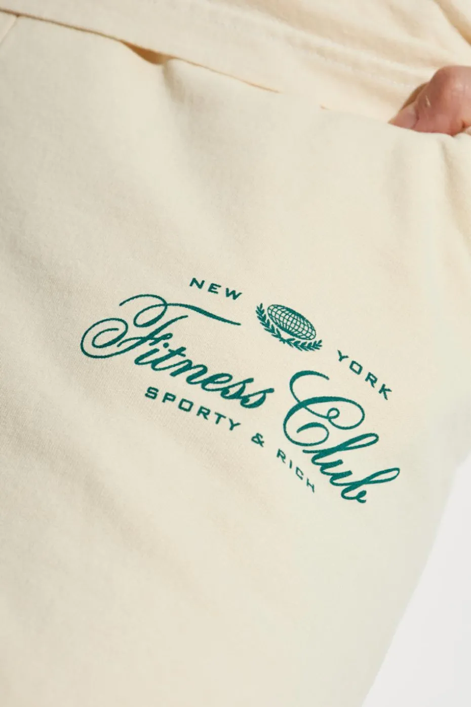 Sporty & Rich kremowy Spodnie dresowe z kolekcji `Wall Street`