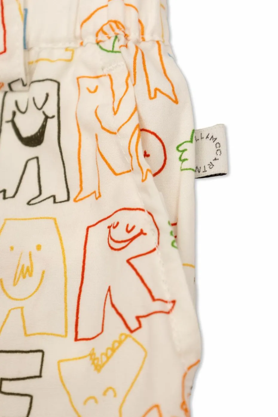 Stella McCartney Kids kremowy Bawełniane spodnie z nadrukiem