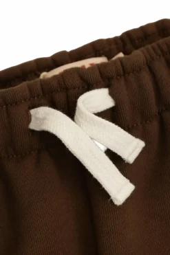 Tinycottons BRĄZOWY Spodnie ze wzorem